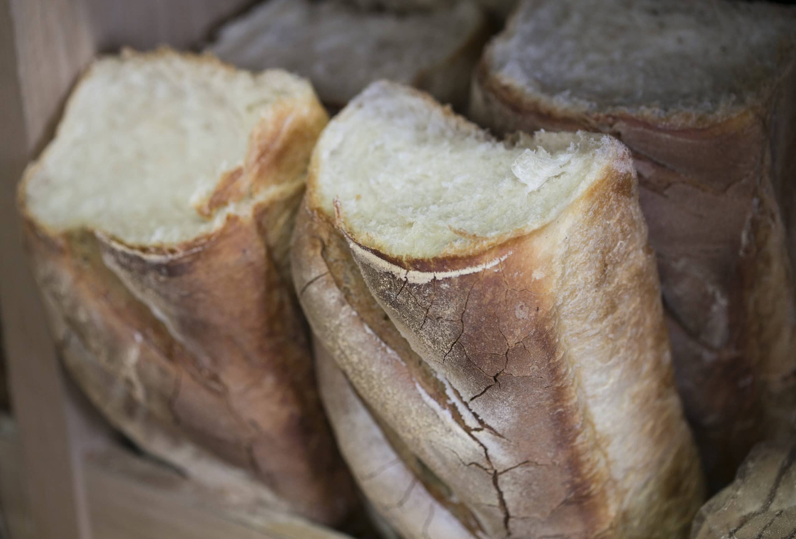Fresh Irish soda bread loaves with crusty exterior and soft interior, perfect for breakfast or lunch.