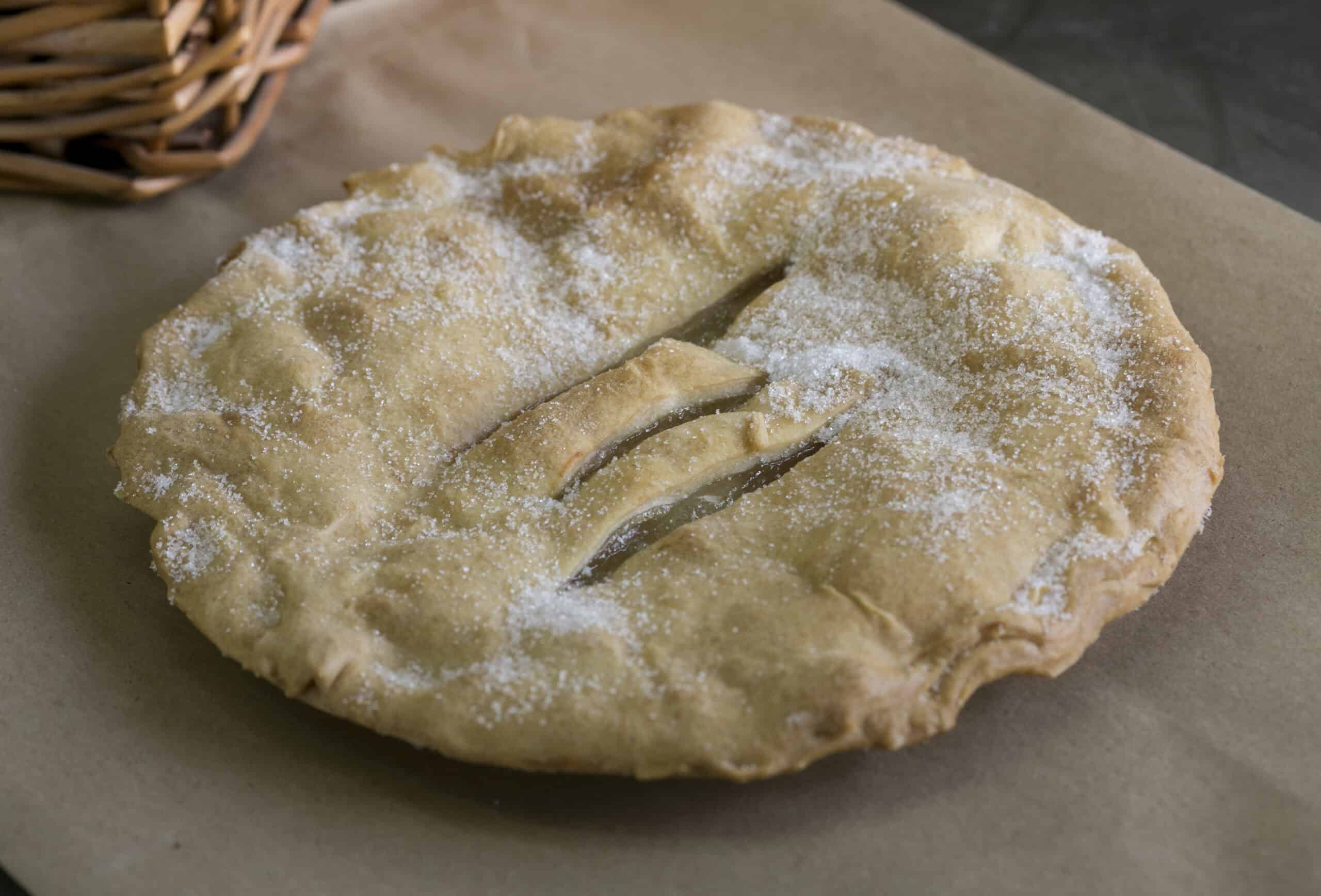 Freshly baked Irish apple pie with golden crust and sugar topping.