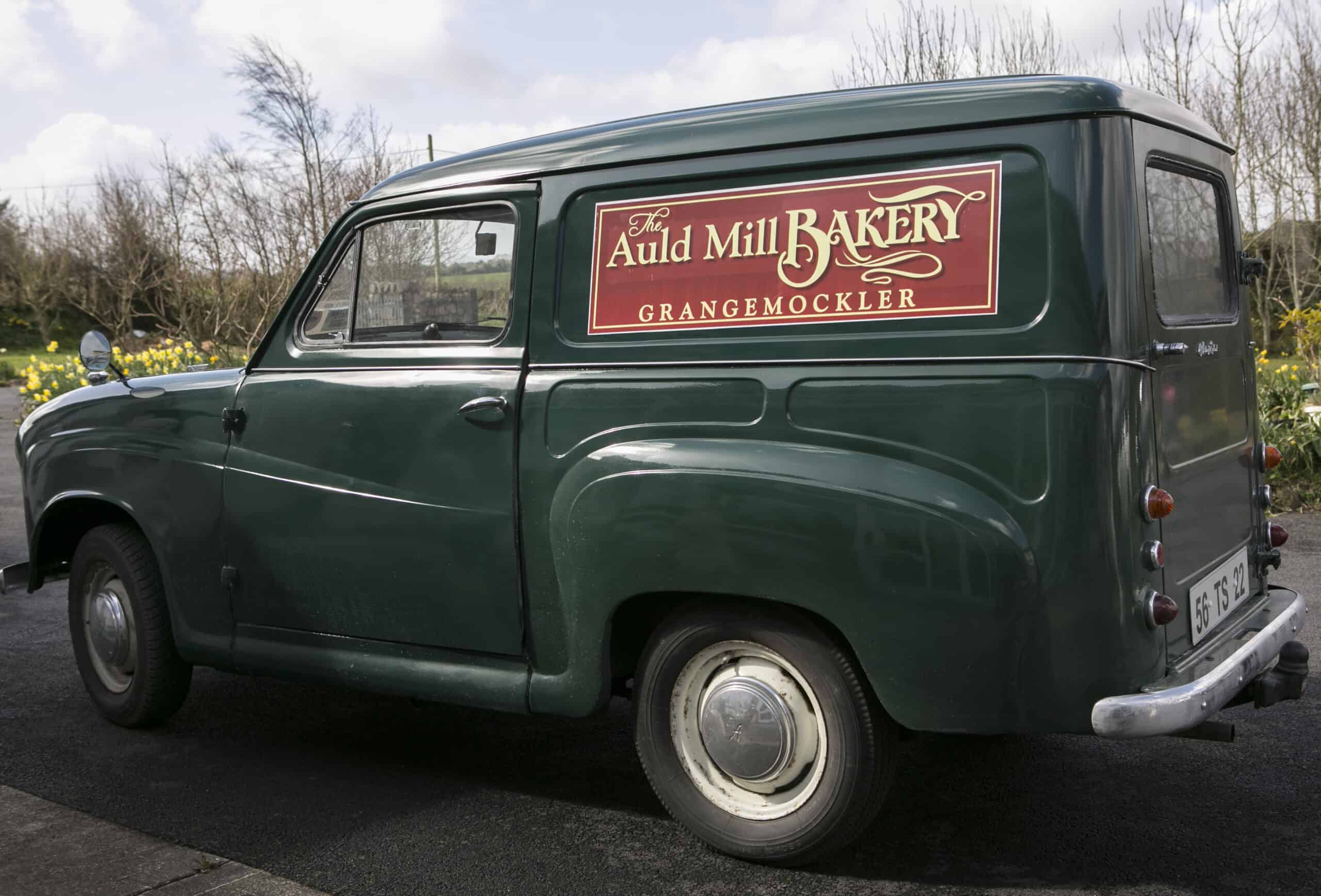 Delivery van for Auld Mill Bakery in Grange, Mockler, showcasing vintage style.